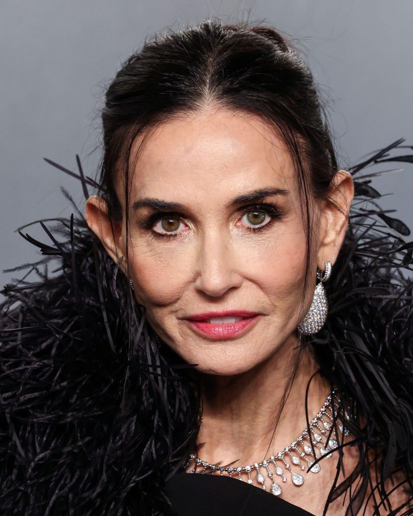 MUSEUM ROW MIRACLE MILE LOS ANGELES CALIFORNIA USA - MARCH 15 Demi Moore wearing custom Balenciaga and Boucheron jewelry arrives at the 2026 Vanity Fair Oscar Party 98th Annual Academy Awards Hosted By Mark Guiducci held at the David Geffen Galleri - Story